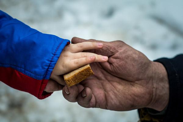 Where does human compassion come from and how does it develop?